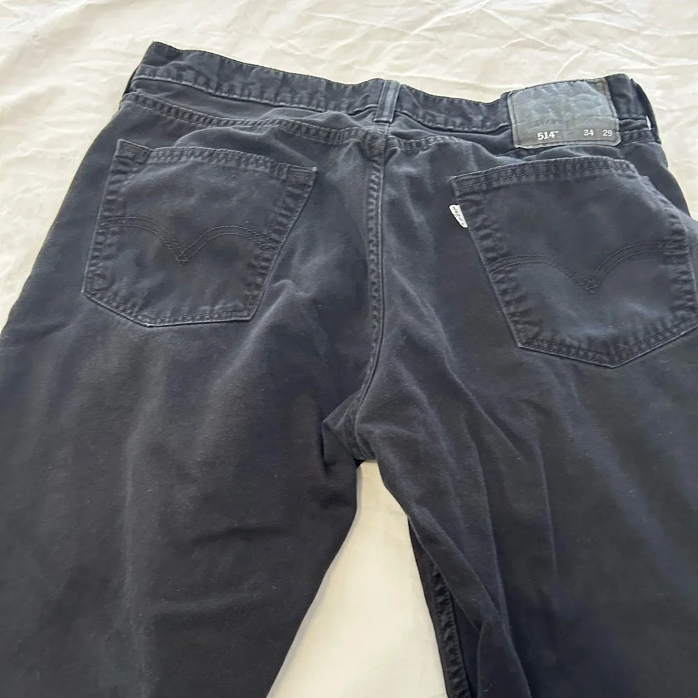 Levi’s 514 Faded Black Denim Jeans size 34x29